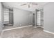 Bedroom with carpet and closet organizer units for storage at 18 E Hermosa Dr # 18, Tempe, AZ 85282