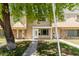 Traditional townhouse with brick and beige exterior and covered front porch, offering classic curb appeal at 18 E Hermosa Dr # 18, Tempe, AZ 85282