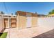 Cozy backyard patio featuring tile pavers, a shed, and privacy walls for outdoor living at 18 E Hermosa Dr # 18, Tempe, AZ 85282