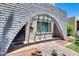 Close up of front door featuring a brick arch, mailbox, and tiled walkway at 1822 W Marlette Ave, Phoenix, AZ 85015
