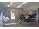 Well-equipped fitness center with modern machines, free weights, and a mirrored wall at 1822 W Marlette Ave, Phoenix, AZ 85015