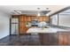 A gourmet kitchen featuring granite countertops, stainless appliances, and custom cabinetry at 1822 W Marlette Ave, Phoenix, AZ 85015
