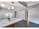 A well-lit kitchen with a central island and stainless steel appliances at 1822 W Marlette Ave, Phoenix, AZ 85015