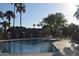 Community pool surrounded by lush landscaping, providing a relaxing oasis at 1822 W Marlette Ave, Phoenix, AZ 85015