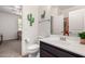 This bathroom features a sink and vanity, with a toilet and shower visible through the doorway at 20565 W Terrace Ln, Buckeye, AZ 85396