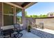 Outdoor patio featuring shaded seating area, creating a relaxing and private outdoor space at 20565 W Terrace Ln, Buckeye, AZ 85396