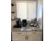 Charming coffee bar area featuring granite countertops and convenient coffee-making accessories at 2100 N Normal Ave, Tempe, AZ 85288