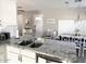Bright kitchen with granite countertops, stainless steel sink, and modern fixtures at 2100 N Normal Ave, Tempe, AZ 85288