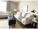 Cozy living room featuring stylish sofas, a plush rug, and modern decor accents at 2100 N Normal Ave, Tempe, AZ 85288