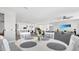 Bright dining area flows into the living room and kitchen, enhancing the home's sense of open space at 22515 E Sonoqui Blvd, Queen Creek, AZ 85142