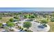 Neighborhood aerial view showcasing the basketball court, pool, and a green space at 22515 E Sonoqui Blvd, Queen Creek, AZ 85142