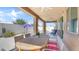 Covered patio featuring a ceiling fan and ample seating, perfect for relaxing outdoors at 22515 E Sonoqui Blvd, Queen Creek, AZ 85142