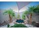 Unique backyard pond adds nature to this private outdoor living area at 2361 N 212Th Dr, Buckeye, AZ 85396