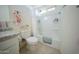 Clean bathroom features a shower over tub and a granite-topped sink at 2361 N 212Th Dr, Buckeye, AZ 85396