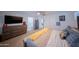 Comfortable main bedroom with plush carpeting, dresser, and ensuite access at 2361 N 212Th Dr, Buckeye, AZ 85396