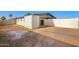 Backyard shows plenty of space, a fence and potential for creative landscaping at 2508 N 58Th Ln, Phoenix, AZ 85035