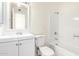 Clean bathroom featuring a tub, toilet, and sink at 2508 N 58Th Ln, Phoenix, AZ 85035