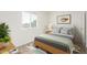 Comfortable bedroom with natural light and a stylish aesthetic at 2508 N 58Th Ln, Phoenix, AZ 85035