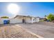 An exterior shot shows a home with covered parking and block fence surrounding the property at 2508 N 58Th Ln, Phoenix, AZ 85035
