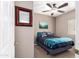 Cozy bedroom features a ceiling fan, and a window for natural light at 3041 E Fremont Rd, Phoenix, AZ 85042