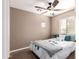 Comfortable bedroom featuring a ceiling fan, neutral colors and a window at 3041 E Fremont Rd, Phoenix, AZ 85042