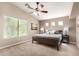 Comfortable main bedroom with a neutral color scheme and a serene ambiance at 3041 E Fremont Rd, Phoenix, AZ 85042