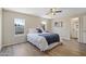 Comfortable bedroom with ample natural light, ceiling fan, and stylish decor at 320 E Mckellips Rd # 46, Mesa, AZ 85201