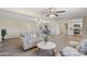 Spacious open-concept living space features hardwood floors, modern furniture, and plenty of natural light at 320 E Mckellips Rd # 46, Mesa, AZ 85201