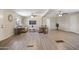 Spacious living room features wood floors, ceiling fans, and comfortable seating arrangement at 320 E Mckellips Rd # 46, Mesa, AZ 85201