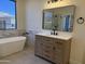 Bathroom featuring a large soaking tub, single vanity, and tiled floors at 33220 N 60Th Way, Scottsdale, AZ 85266