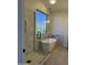 Bathroom featuring a glass shower, soaking tub, and tile floors at 33220 N 60Th Way, Scottsdale, AZ 85266