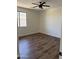 Bedroom with wood flooring and natural light at 33220 N 60Th Way, Scottsdale, AZ 85266