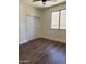 Bedroom with vinyl wood flooring, white trim and neutral walls at 33220 N 60Th Way, Scottsdale, AZ 85266