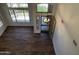 Foyer with hardwood floors, a decorative chandelier, and large windows providing plenty of natural light at 33220 N 60Th Way, Scottsdale, AZ 85266