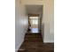 Bright hallway with hardwood floors and access to multiple rooms at 33220 N 60Th Way, Scottsdale, AZ 85266