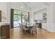 Elegant dining room with stylish lighting, wet bar, and wine refrigerator at 3825 E Coolidge St, Phoenix, AZ 85018