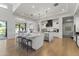 Open kitchen with a large island and modern stools, perfect for entertaining at 3825 E Coolidge St, Phoenix, AZ 85018