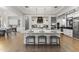 Bright, modern kitchen with white cabinets and oversized island with seating at 3825 E Coolidge St, Phoenix, AZ 85018