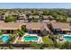 Picture of a home from above showcasing a pool, landscaped yard, and neighborhood at 4010 E Hamblin Dr, Phoenix, AZ 85050