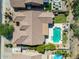 Expansive property showcasing a sparkling pool, lush green lawn and meticulously designed landscaping at 4010 E Hamblin Dr, Phoenix, AZ 85050