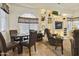 Open-concept dining area with a large window, an arched transom, and a decorative display niche at 4202 E Broadway Rd # 223, Mesa, AZ 85206