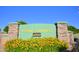 Verde Groves entrance sign featuring colorful yellow flowers at 4202 E Broadway Rd # 223, Mesa, AZ 85206