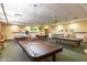 Spacious game room with multiple pool tables and overhead lighting at 4202 E Broadway Rd # 223, Mesa, AZ 85206