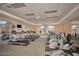 Bright gym with treadmills, exercise bikes, mirrored walls, and plenty of natural light at 4202 E Broadway Rd # 223, Mesa, AZ 85206