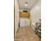 Clean laundry area with washer/dryer and cabinet storage at 4202 E Broadway Rd # 223, Mesa, AZ 85206