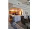Open floor plan showcases a seamless transition from the living area to the modern kitchen at 4202 E Broadway Rd # 223, Mesa, AZ 85206