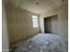 Unfinished bedroom featuring a closet and window with natural light at 47706 W Kenner Dr, Maricopa, AZ 85139