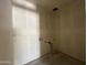 Unfinished laundry room area showing drywall, ready for appliances and finishing touches at 47706 W Kenner Dr, Maricopa, AZ 85139