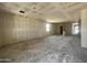 Spacious unfinished living room with bright natural light and an open floor plan at 47706 W Kenner Dr, Maricopa, AZ 85139