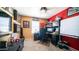 This room is being used as an office and features neutral walls, carpeted floors, and ample lighting at 7274 W State Ave, Glendale, AZ 85303